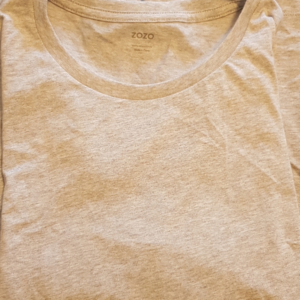 New grey tee. Plain.